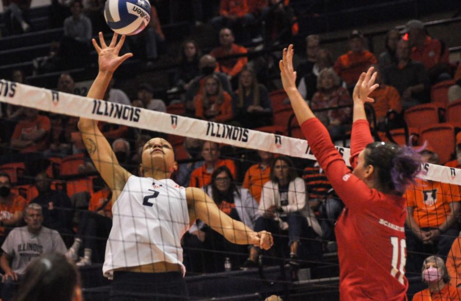 Senior+middle+blocker+Rylee+Hinton+goes+to+hit+the+ball+over+the+net+during+Illinois+match+up+against+Rutgers+on+Wednesday.+