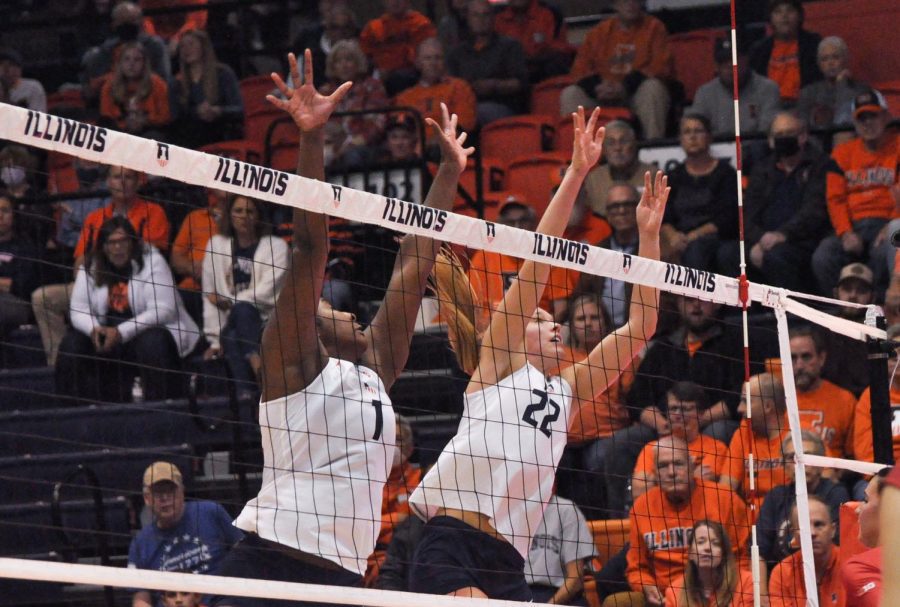Senior+middle+blocker+Kennedy+Collins+%281%29+and+redshirt+freshman+setter+Brooke+Mosher+%2822%29+go+to+block+the+ball+during+the+game+against+Rutgers+on+Wednesday.+The+Illini+sweep+the+Scarlet+Knights%2C+3-0.+