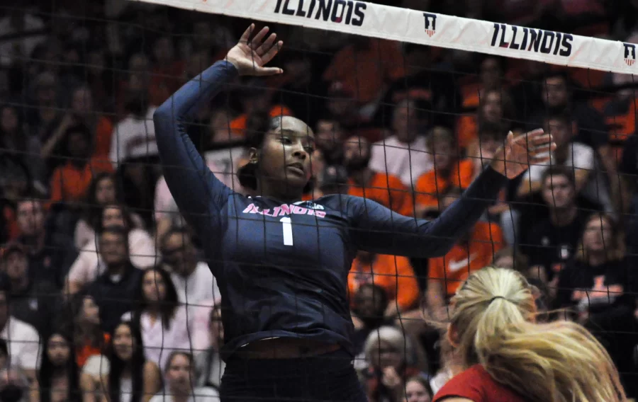 Senior+middle+blocker+Kennedy+Collins+prepares+to+hit+the+ball+over+the+net+during+the+first+set+against+No.+3+Nebraska+on+Saturday.+The+Illini+falls+to+the+Cornhuskers%2C+3-0.+