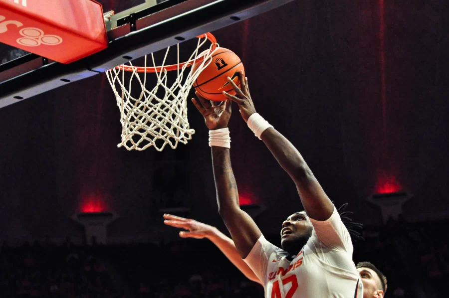 Redshirt sophomore forward Dain Dainja goes to dunk the ball during the exhibition game against Quincy on Oct. 28. 