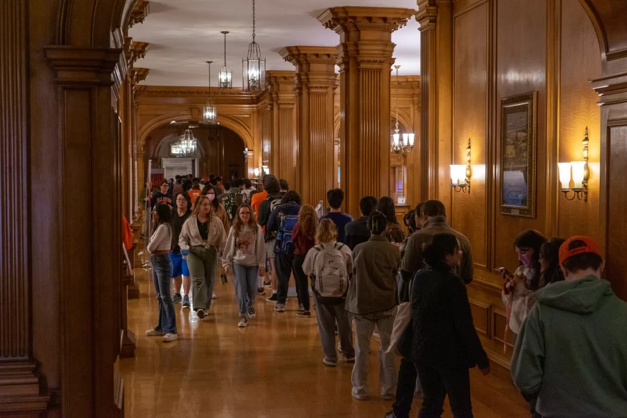 Voters wait in line at the Illini Union on Nov. 8. The line began on the west end of the building and wrapped around the northeast corner of the main hallway.