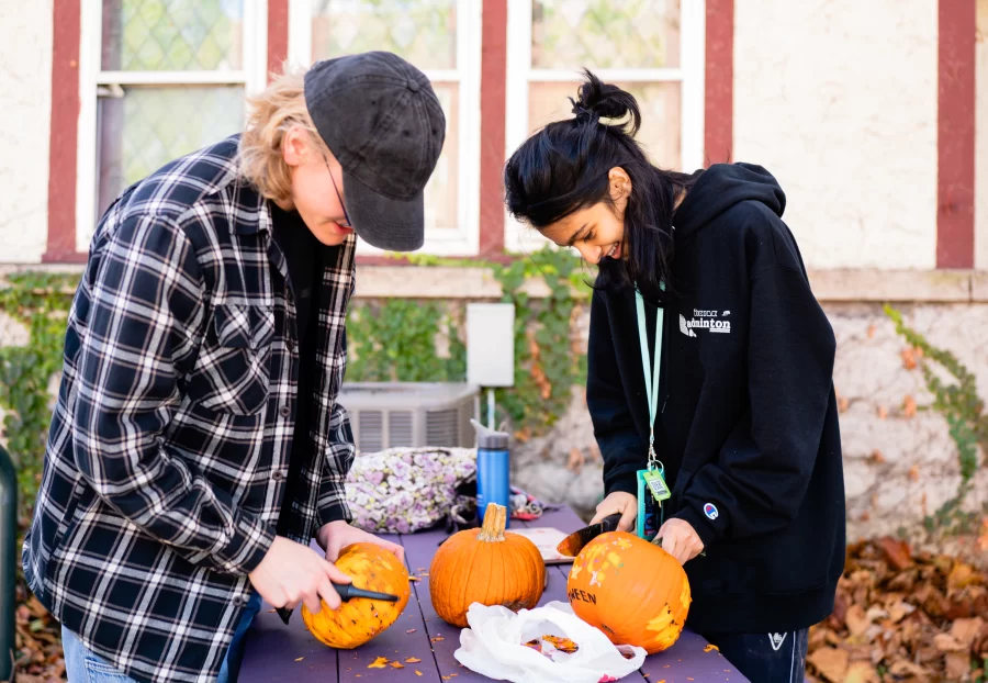FAA freshman Trey McCallister and Sachi Tillu, freshman in LAS prepare pumpkins to be smashed at Red Herring on Sunday. 
The Student for Environmental Concerns held its first pumpkin smashing event supported by SCARCE.  
