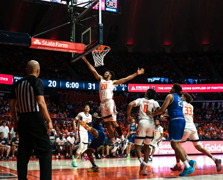 Guard/forward Ty Rodgers makes an effort for layup against Eastern Illinois  during Mondays game. Despite the teams lack of offensive rhythm from the Illini Rodgers managed a team high of five-assists alongside a great performance. 