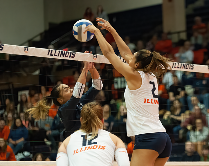 Senior middle blocker Rylee Hinton smacks the ball over the net during the game against No. 11 Penn State on Oct. 26. 