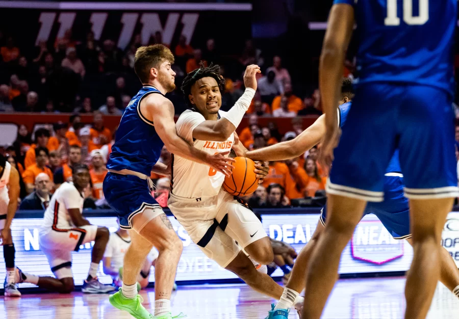 Guard+Terrance+Shannon+Jr.+pushes+through+EIUs+defense+during+last+Mondays+game.+The+Illini+achieve+another+victory+during+Monday+nights+match+against+Monmouth+with+a+score+of+103-65.