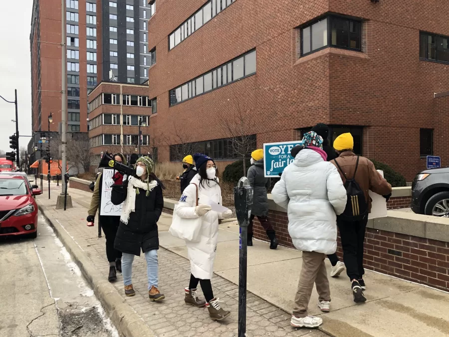 GEO protesters on Feb. 26 voice opinions over mask policy.
GEOs and Universitys contract negotiations reach an inclusive agreement towards the end of the year.   