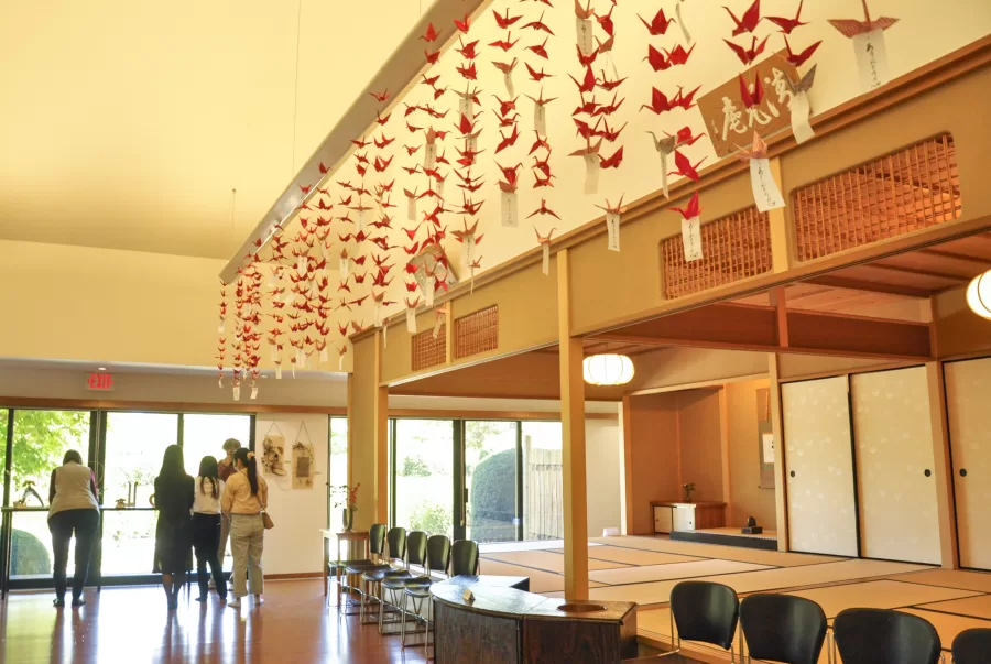 Origami swans, created by students of ARTJ 199, hang on the ceilings of the Japan House on Oct. 8. The Japan House recently receives a $3.3 million donation from the Ogura-Sato family. 
