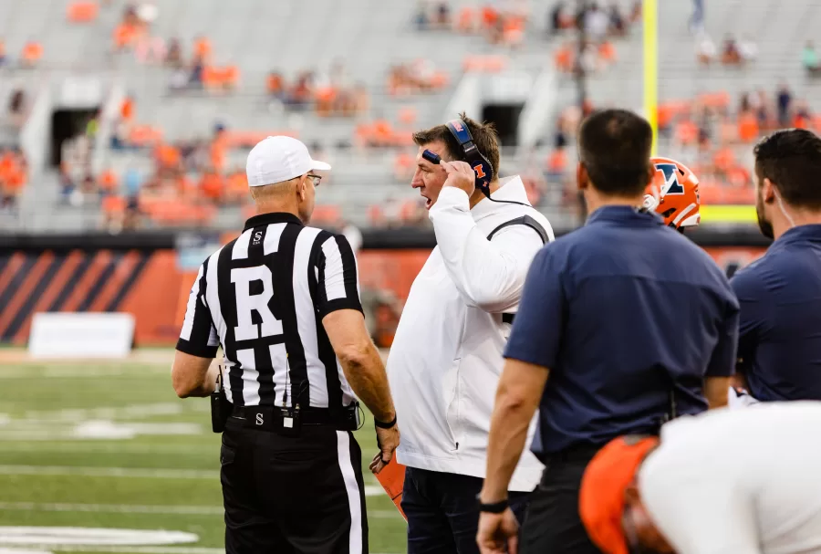 Head coach Bret Bielema speaks to referee during game against Virginia on Sept. 10.
Bielema speaks on the Illinis defensive coordinator position and Ryan Walters who is set to transfer from the Illini as announced on Dec. 13.
