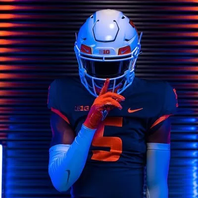 Then-Illinois defensive back recruit Zach Tobe poses for a photo during a visit to Illinois. Tobe is one of 21 commitments to sign with Illinois on December 21, 2022.