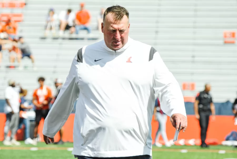 Coach+Bret+Bielema+walks+the+field+on+Aug.+27.%0AThe+Illini+seek+to+improve+after+a+defeat+from+Mississippi+State+during+the+ReliaQuest+Bowl+on+Monday.