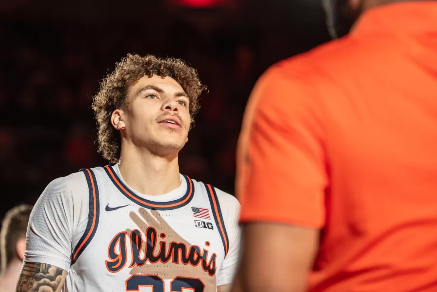 Forward Coleman Hawkins walks onto the court to face Wisconsin on Saturday.
The Illini respond after defeat from Northwestern on Jan. 4, and upcoming game against Wisconsin on Tuesday.