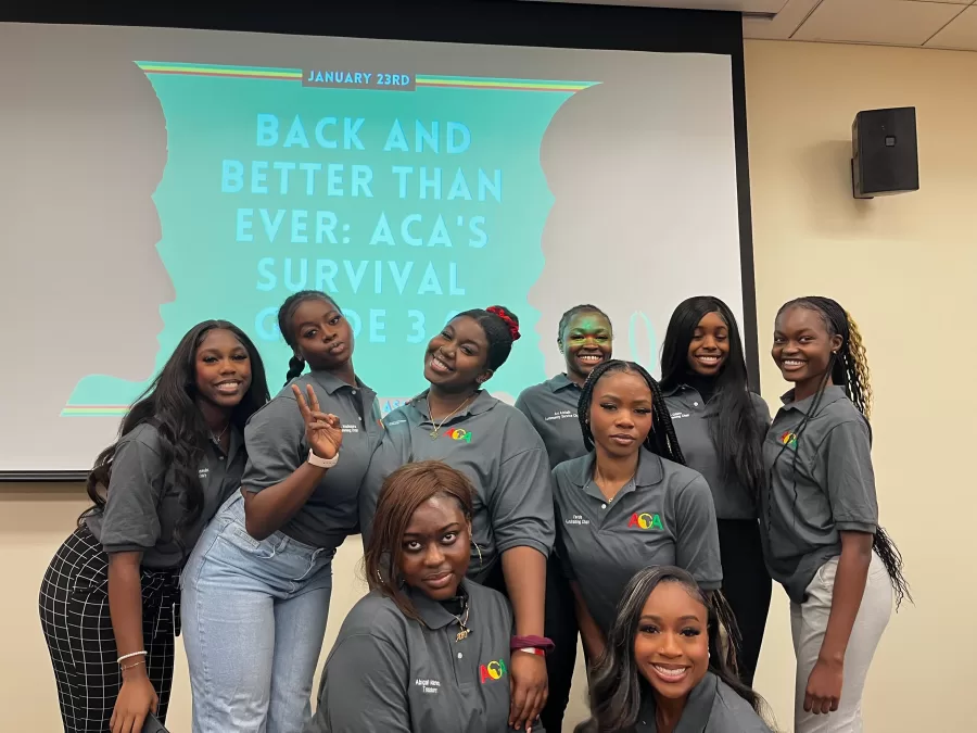 The executive board members of of the African Cultural Association pose for a picture at their meeting on Monday. The association provides tools and resources to the community, not just those of African descent. 