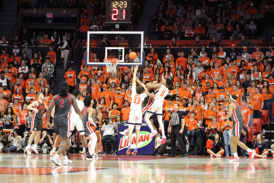 Junior+forward+Coleman+Hawkins+goes+for+a+difficult+layup+against+Ohio+State+on+Tuesday.+Hawkins+played+a+strong+game%2C+starting+the+Illini+off+with+a+three-point+shot+and+finishing+the+game+with+a+slam+dunk.