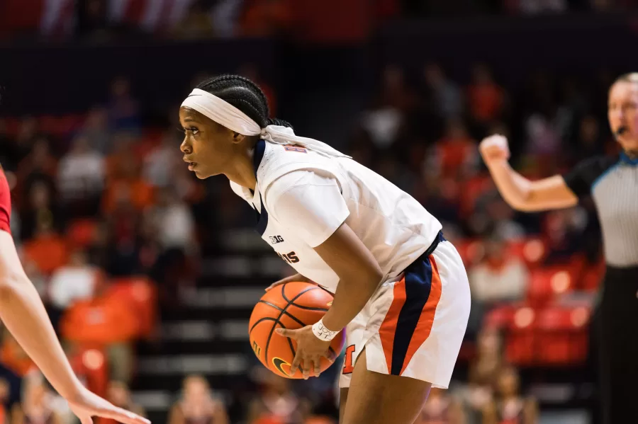 Guard Genesis Bryant tries to get past Indianas defense on Wednesday.
Bryant led the team during Sundays game against Northwestern resulting in a win for the Illini. 