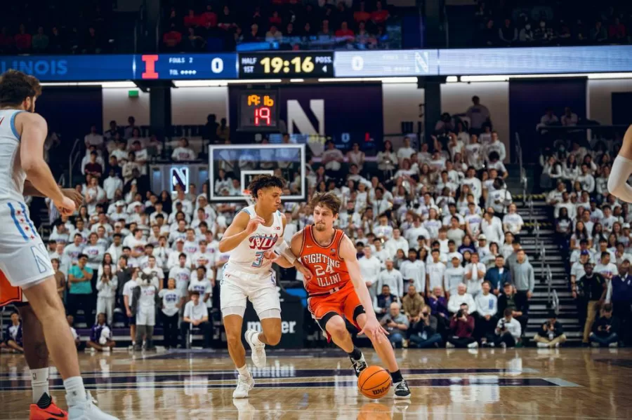Guard%2FForward+Matthew+Myer+pushes+through+Northwestern+on+Wednesday.%0AThe+Illini+begin+the+2023+year+on+a+disappointing+60-73+loss+to+Northwestern+on+Jan.+4.++