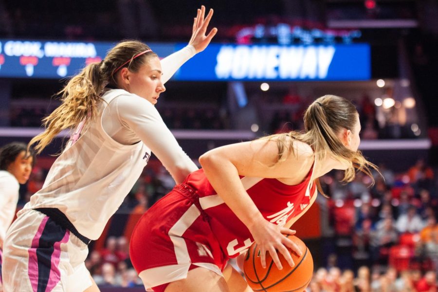 Junior forward Kendall Bostic guards Nebraska’s Isabelle Bourne during Illinois’ final home game on Wednesday. 