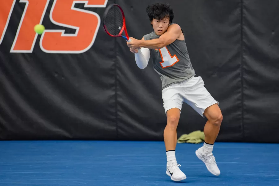 Junior Hunter Heck returns the ball during a match against Purdue on April 24, 2022. The Illini have shown to struggle on the road recently after two losses this weekend.