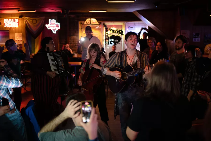 New York City Band Bandits on the Run perform an encore while walking across the bar at Rose Bowl Tavern on Feb. 11.