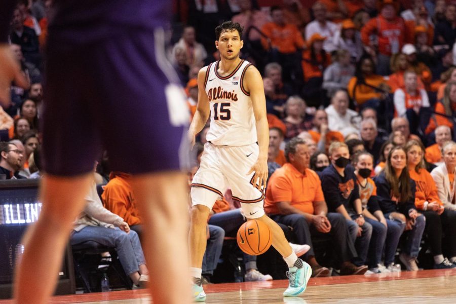 Guard R.J. Melendez gets the ball to the opposing side of the court on Thursday. Melendez showed growth in his role for the team during his play time against Ohio on Sunday.
