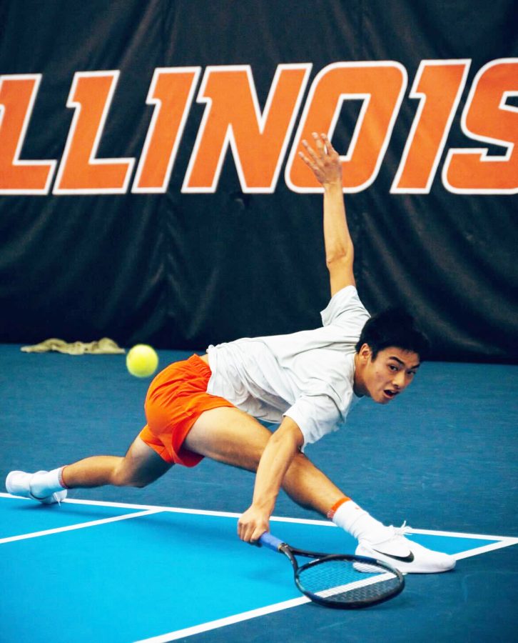 Freshman Kenta Miyoshi dives deep to save the ball. Newcomer Miyoshi adjusts to college life and continues to his first college tennis season this year.