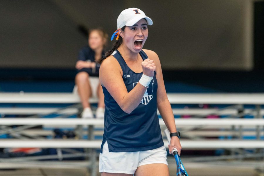 Junior Kate Duong celebrates scoring against Georgia Tech on Feb. 3. Duong and sophomore Kida Ferrari brought the Illini to a third set on Sunday against Purdue leading to the Illini to remain undefeated.