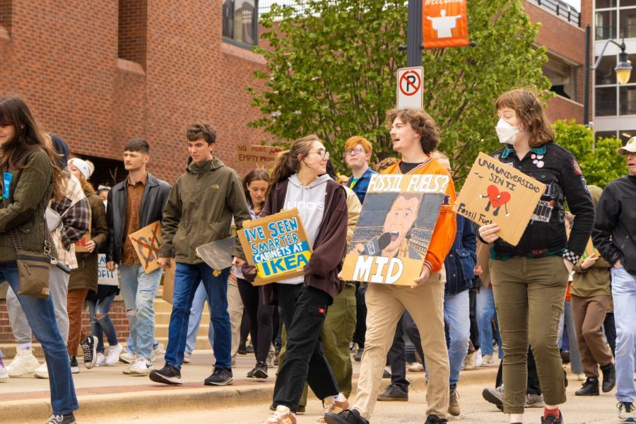 Students for Environmental Concerns marched beginning at Alma Mater calling for the University to divest in fossil fuels.