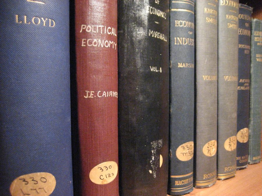 A collection of economics textbooks from the turn of the century. Former opinions editor Andrew Prozorovsky reflects on his time as an economics major at UI, and how the study of economics is prone to bias and encourages individualism. This indicates a need to reevaluate how the subject is taught in schools.