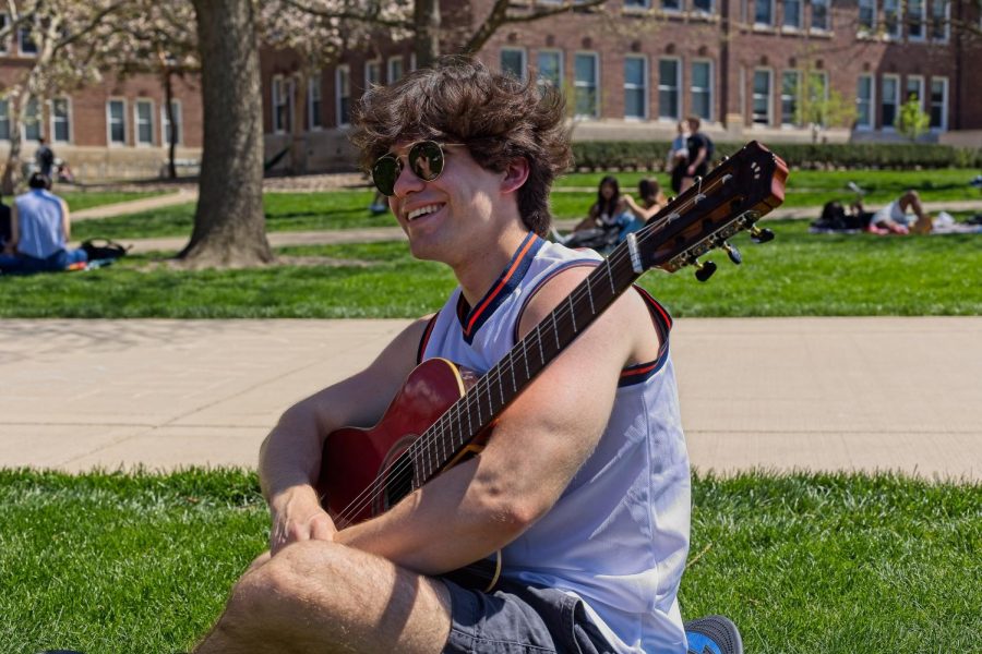Salvatore Galluzo, senior in LAS, hangs out with his friend Kevin O’Hara, senior in FAA on the quad on Thursday.