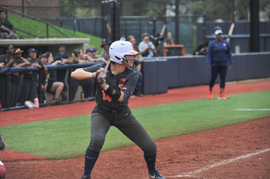Senior outfielder Kelly Ryono hits a ball to straightaway center in the game against Ohio State on April 15 to give the Illini a 2-0 lead.