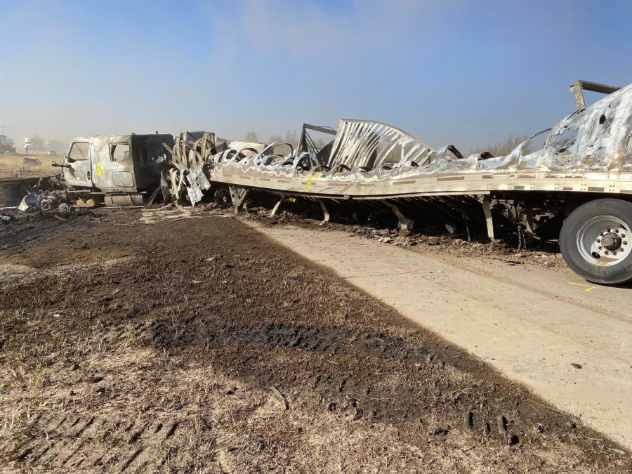 A semi-truck destroyed on the side of the road after multiple vehicle crash on Interstate 55. 