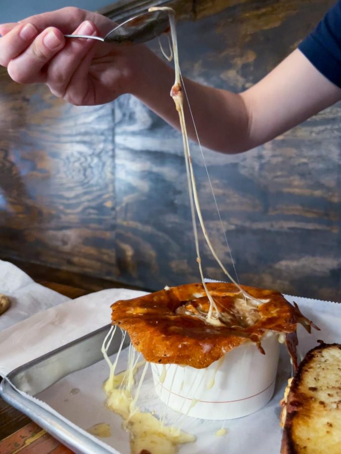The Bread Company’s french onion soup includes a striking gruyère cheese pull