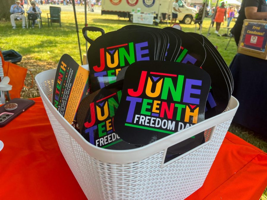 Handheld+Juneteenth+fans+offered+to+attendees+of+the+Douglass+Park+Juneteenth+celebration+on+Saturday