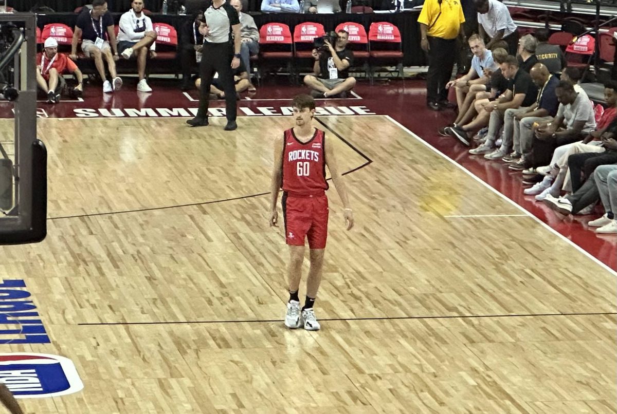One-year Illini Matthew Mayer on the floor during his NBA 2K24 Summer League debut. After sitting for Houstons first two games, Mayer earned a 19 point, 10 rebound double-double. 