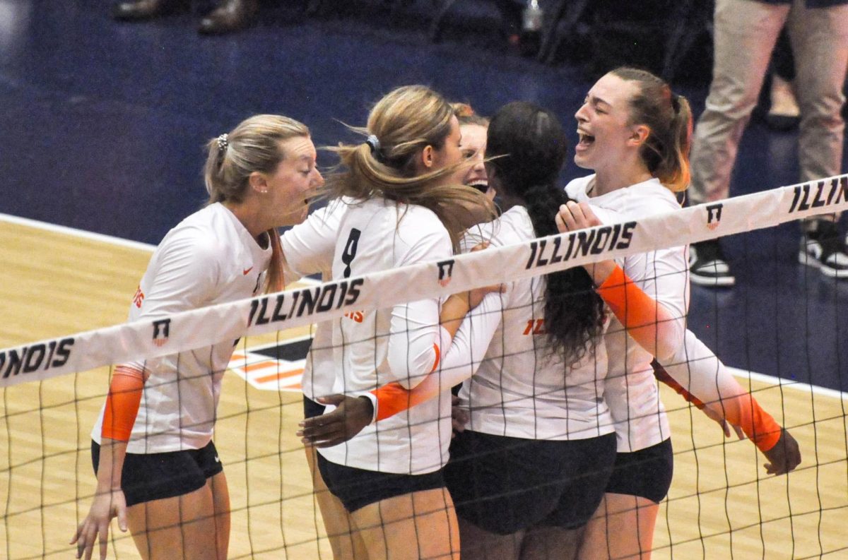 The Illini come together celebrating on Sept. 23, 2022 during a match against Maryland. The Illini had their first home home game on Tuesday which ended in another win for the Illini.