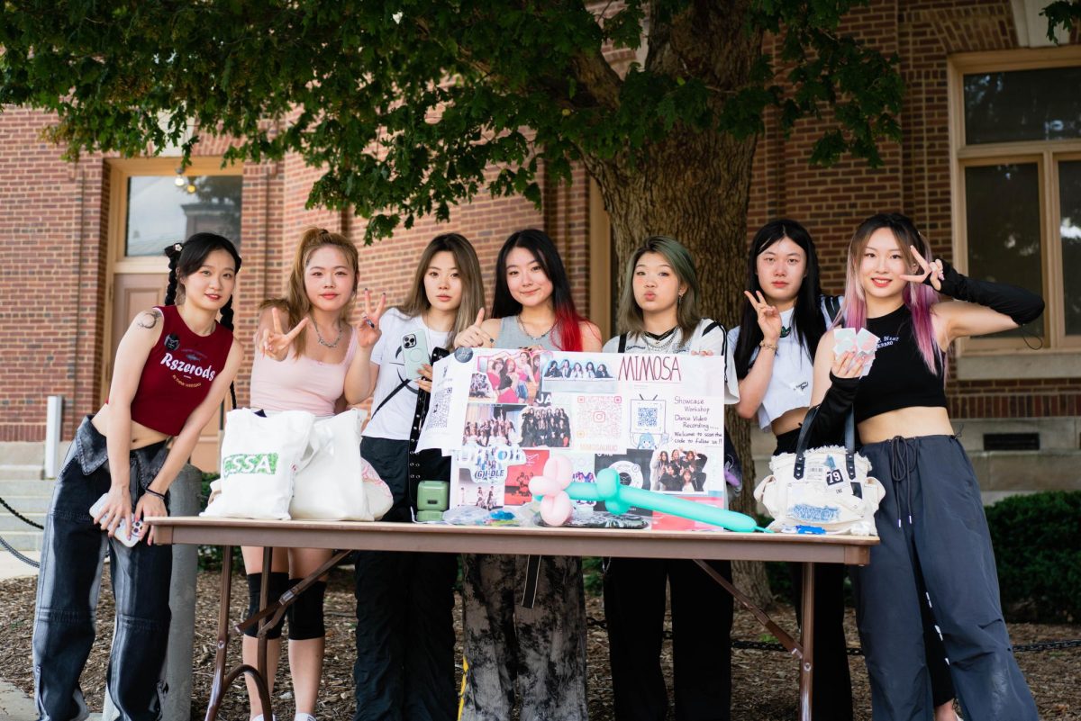 MIMOSA dance crew at their table on Sunday during Quad Day.