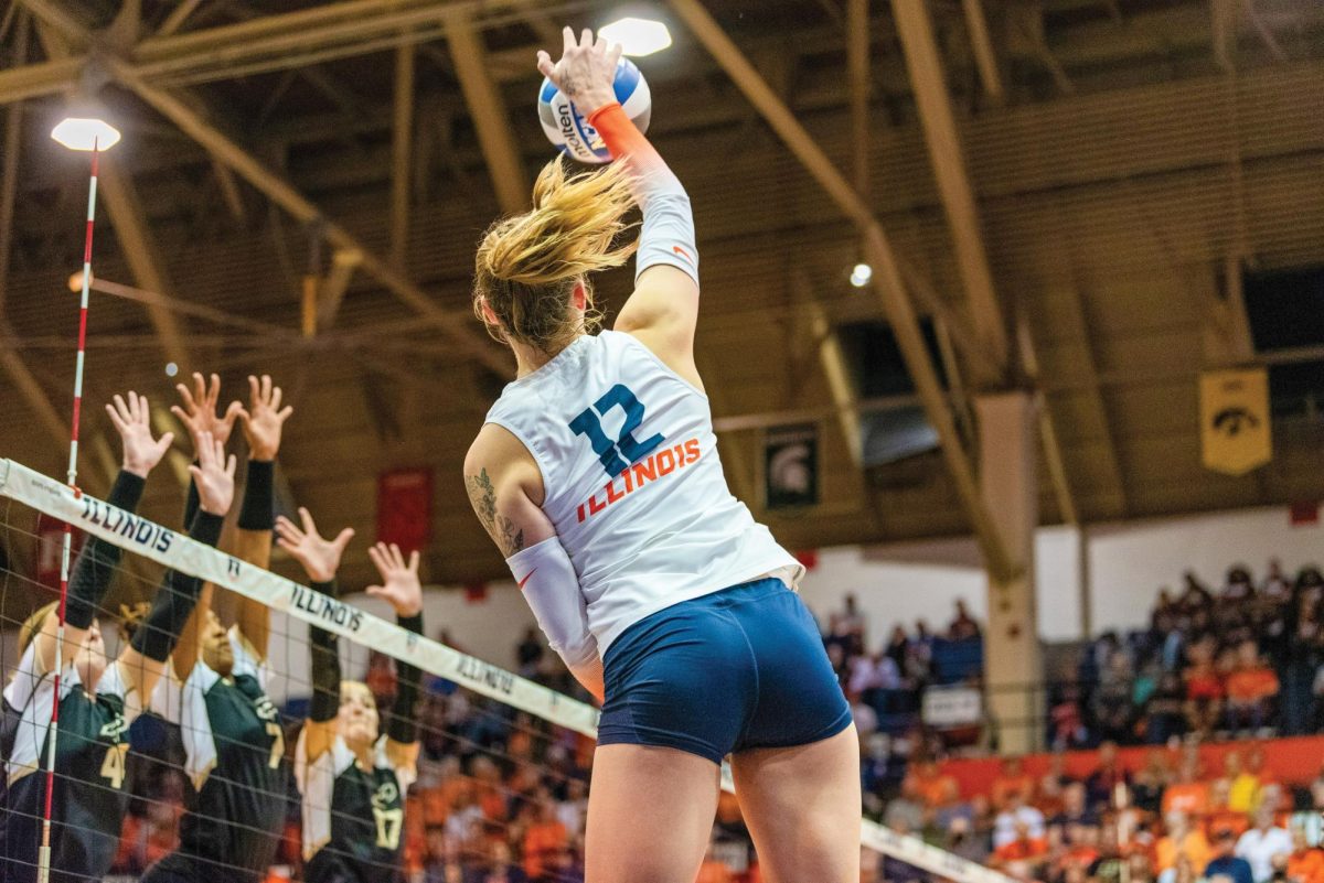 Senior outside hitter Raina Terry hits the ball during a game against Purdue on Sept. 30. After last season’s perfectly even record, the Illini hope to bounce back for a more productive year.
