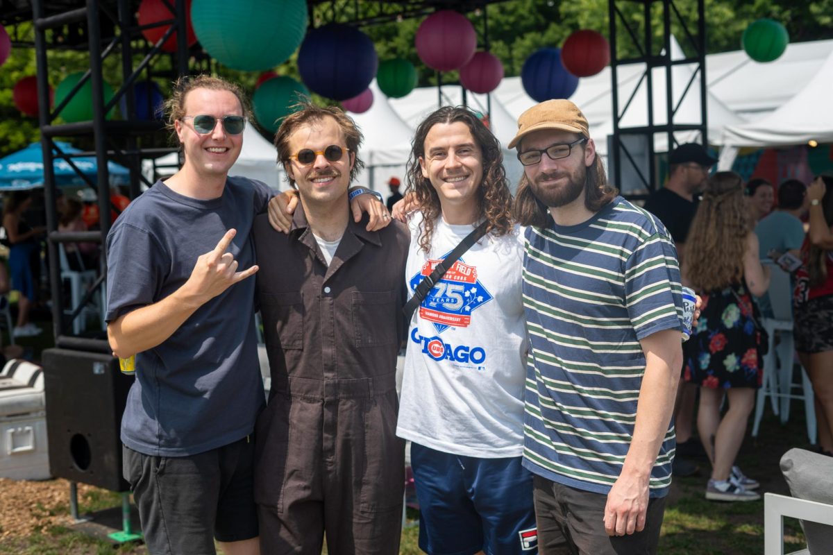 (Left to right) Peter Wilton, Christopher Vanderkooy, Neil Smith and Mikey Pascuzzi during an interview on Friday at Lollapalooza.
