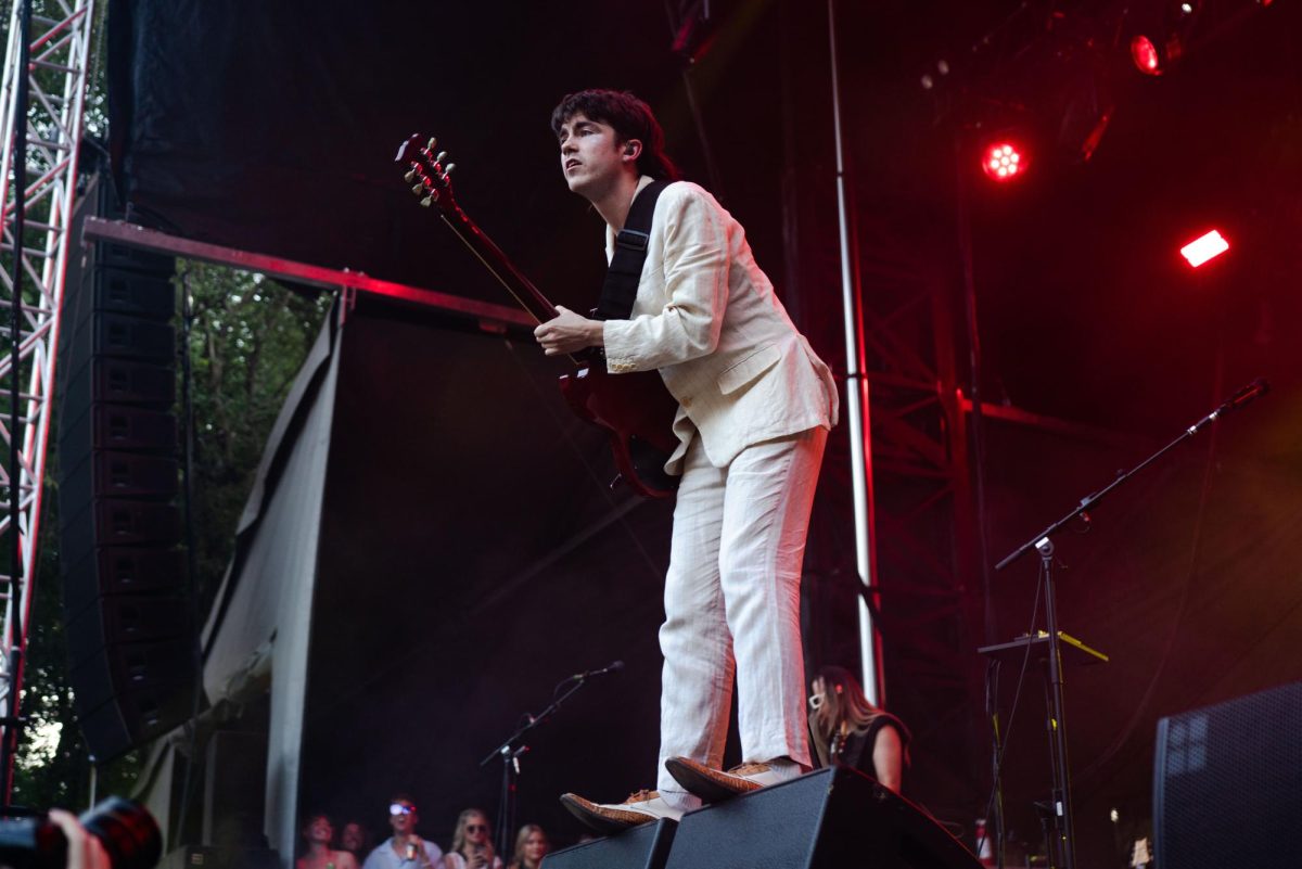 Declan McKenna stands on the Bacardi stage speakers during his performance on Friday evening.