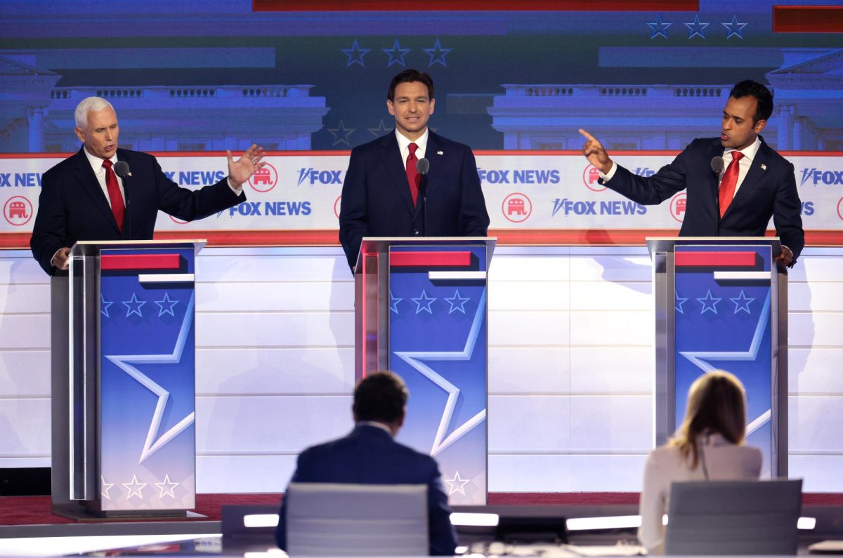 Republican presidential candidates, from left to right, former U.S. Vice President Mike Pence, Florida Gov. Ron DeSantis and Vivek Ramaswamy participate in the first debate of the GOP primary season hosted by FOX News at the Fiserv Forum on Aug. 23 in Milwaukee, Wisconsin.