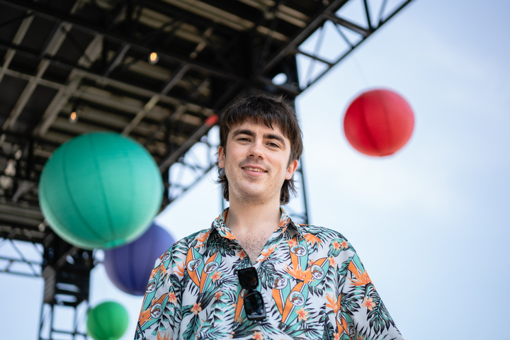 Declan McKenna hangs out at the press lounge before his concert set later in the day.