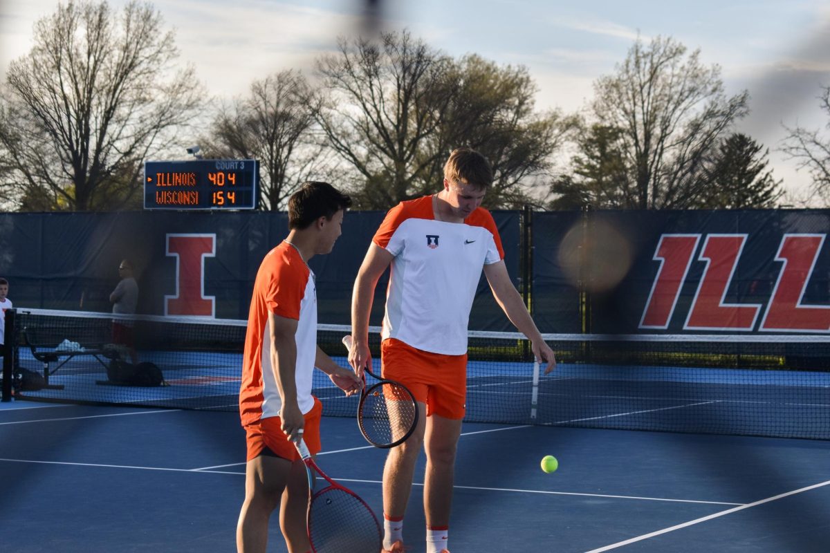 Hunter Heck and Karlis Ozolins Team Up in Doubles Match Against Wisconsin at Atkins Tennis Center on Apr. 14th.