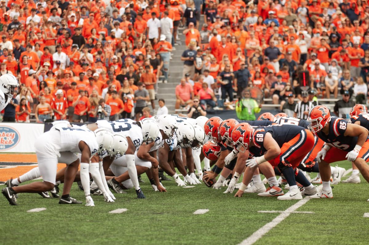 Illini and Penn State lineup against each other before starting their plays on Sunday.  
