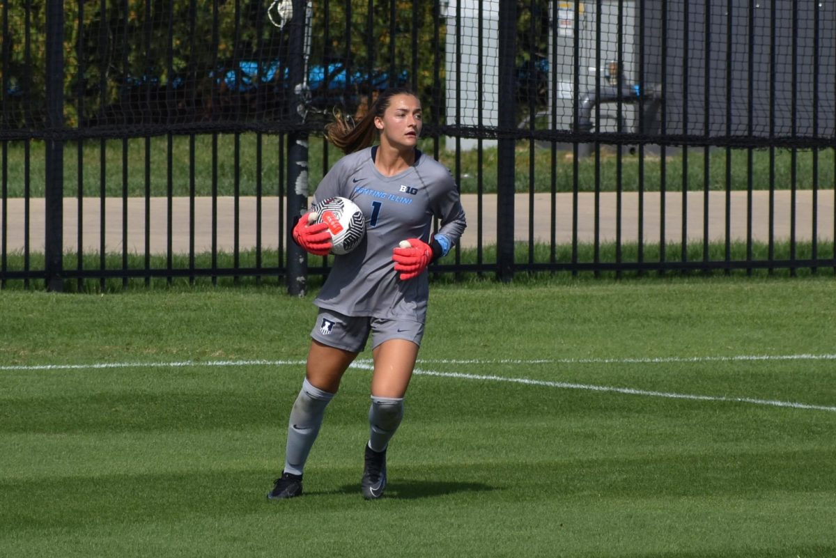 Senior goalkeeper Julia Cili securely holds the ball in a duel against Michigan on Sept. 24.