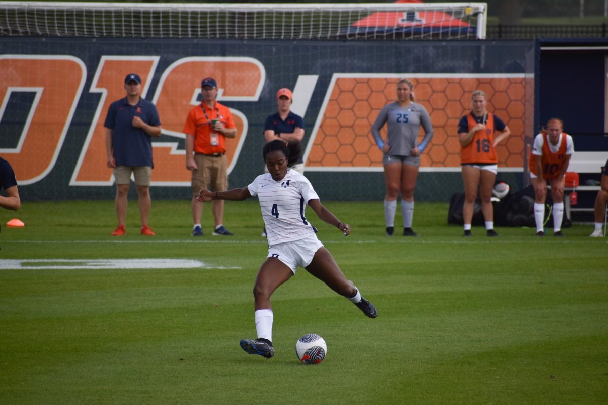 Senior forward Makala Woods attempts to score in todays game against Michigan. Woods sparks the offensive surge and creates numerous early chances. 