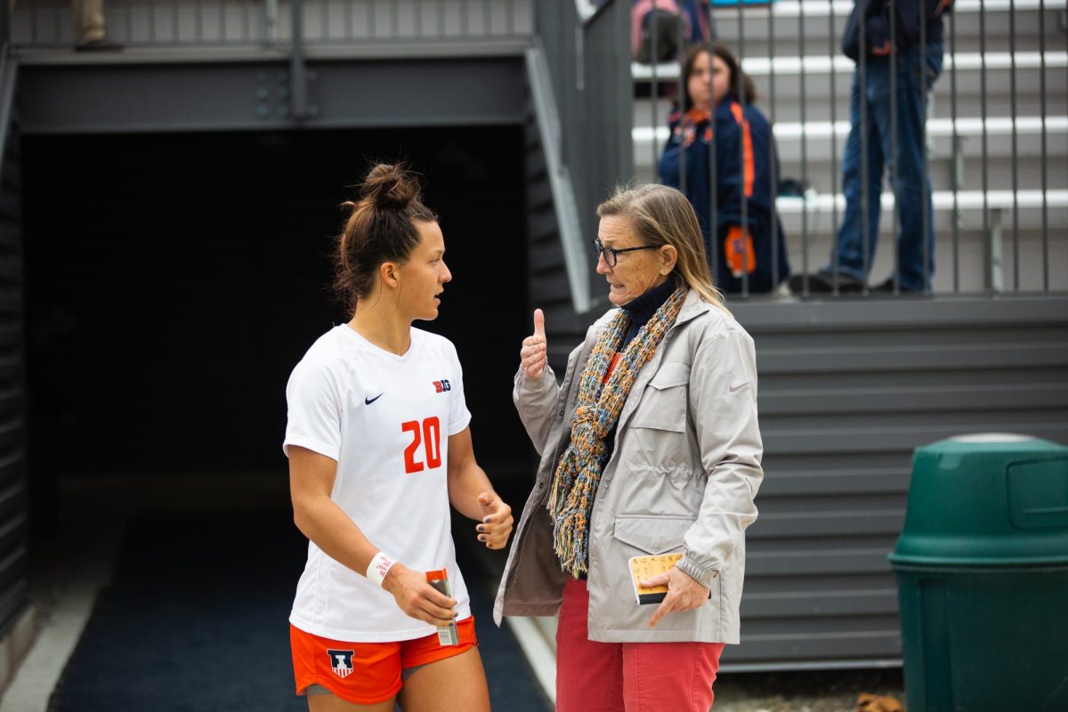 Forward Makena Silber and Head coach  Janet Rayfield speak toe each other before playing in the senior day match against Rutgers on Oct. 23, 2021.
Silber makes her return to Illini soccer after recovering from injury for her final season.