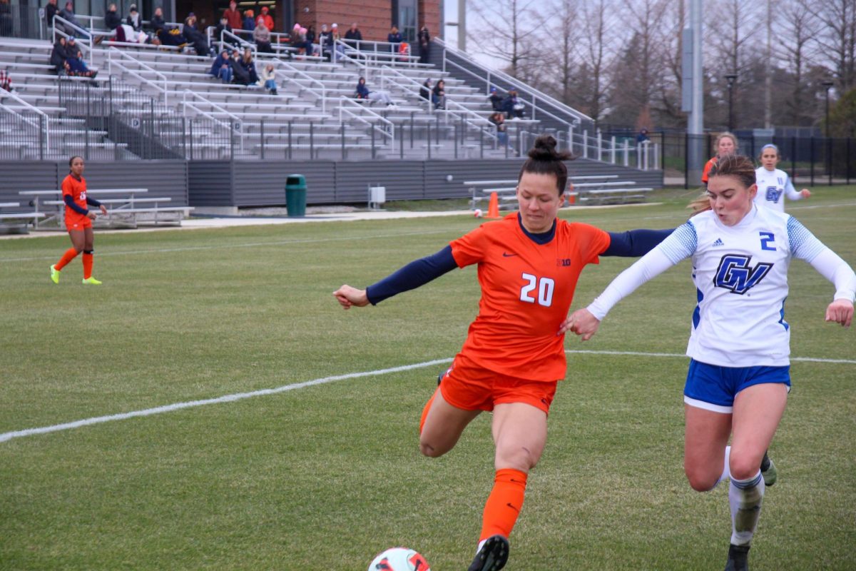 Forward Makena Silber rushes to keep the ball away from Grand Valley State on Apr. 2, 2022. 
Silber made her presence known during Sundays game against Iowa that ended in a draw.
