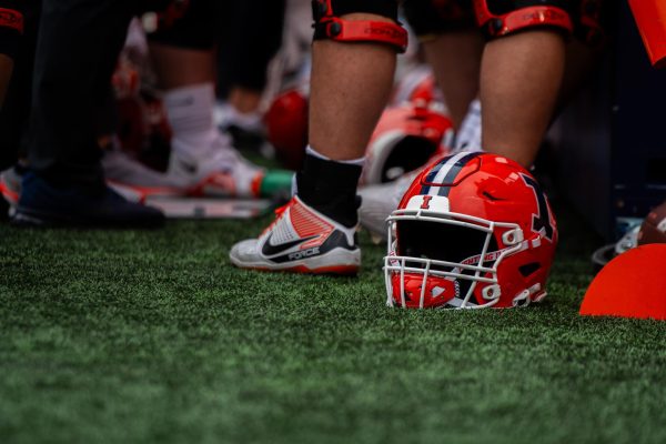 Illini helmet lays on the turf during game against Penn State on Saturday.
Sports columnist Ben Fader writes on the sexual misconduct within football.