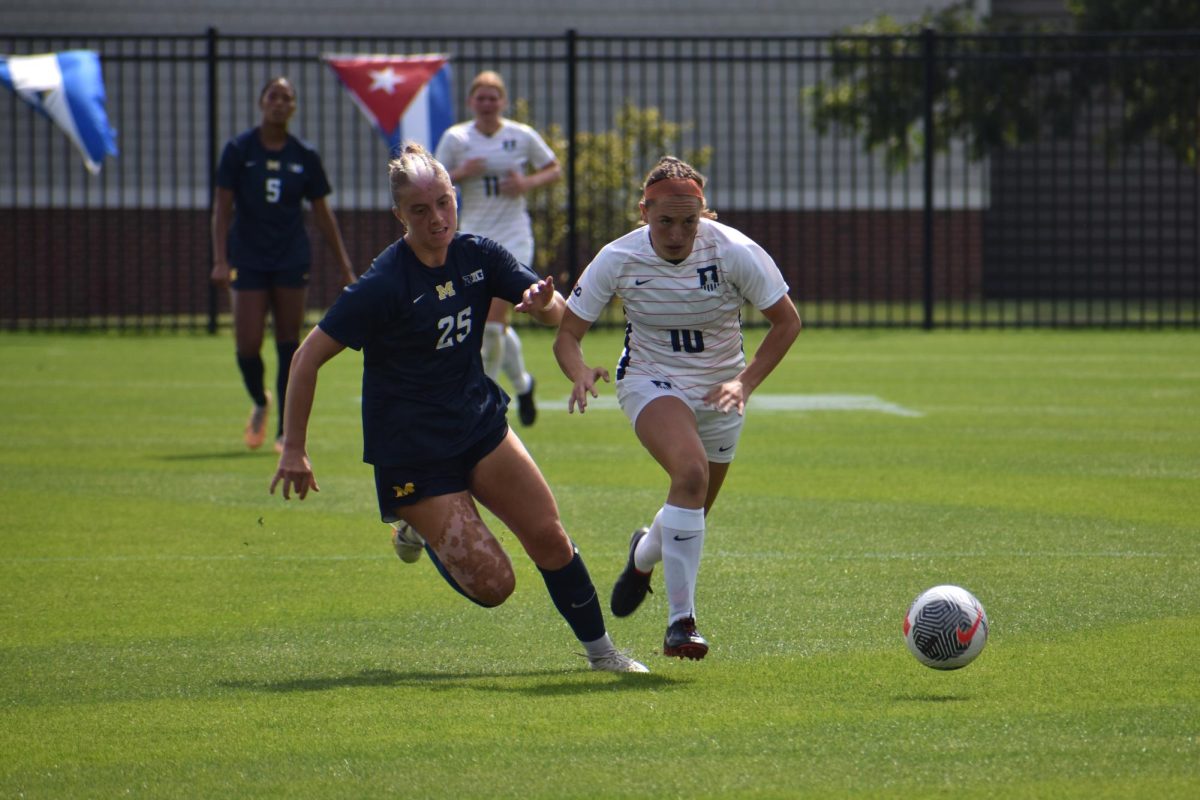 Junior Abby Lynch fights for the ball on Sept. 24.
Illinois will be facing off against Wisconsin tonight.