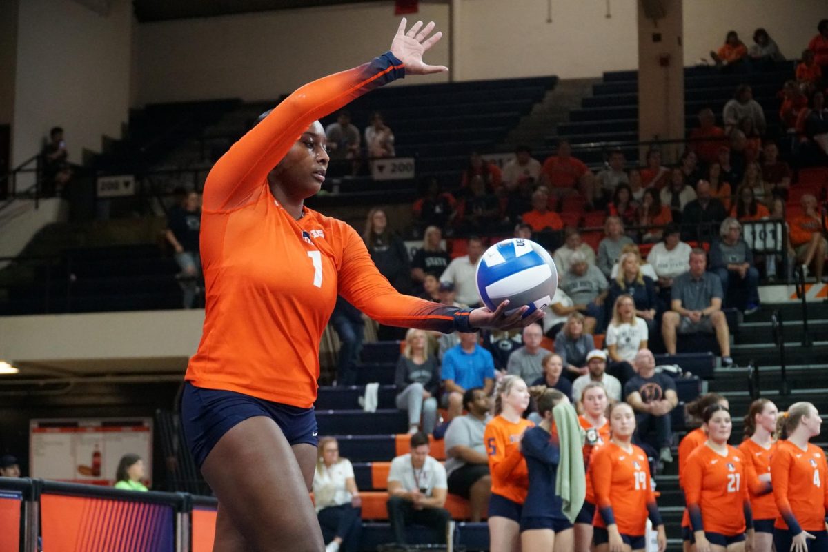 Graduate middle blocker Kennedy Collins prepares to serve in the second set against the Penn State Nittany Lions. 
The Illini will face off against Purdue on Wednesday. 