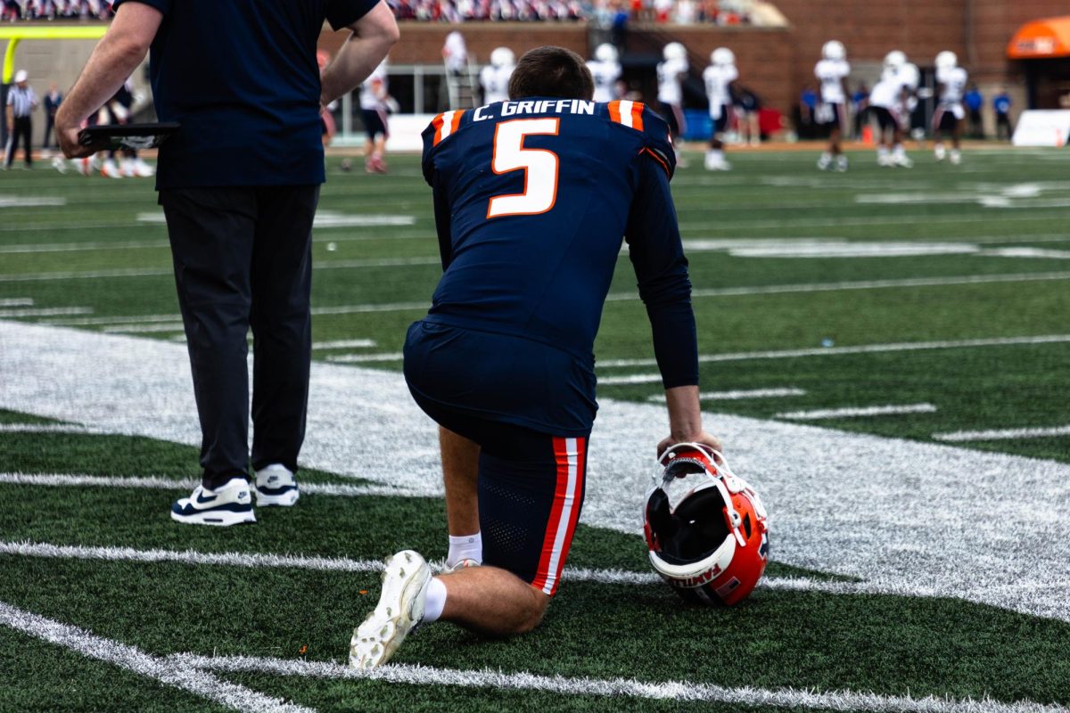 Kicker and punter Caleb Griffin takes a rest before getting on the field on Sept. 23. 
Illinois will be making a return to Memorial Stadium to face off against Wisconsin.
